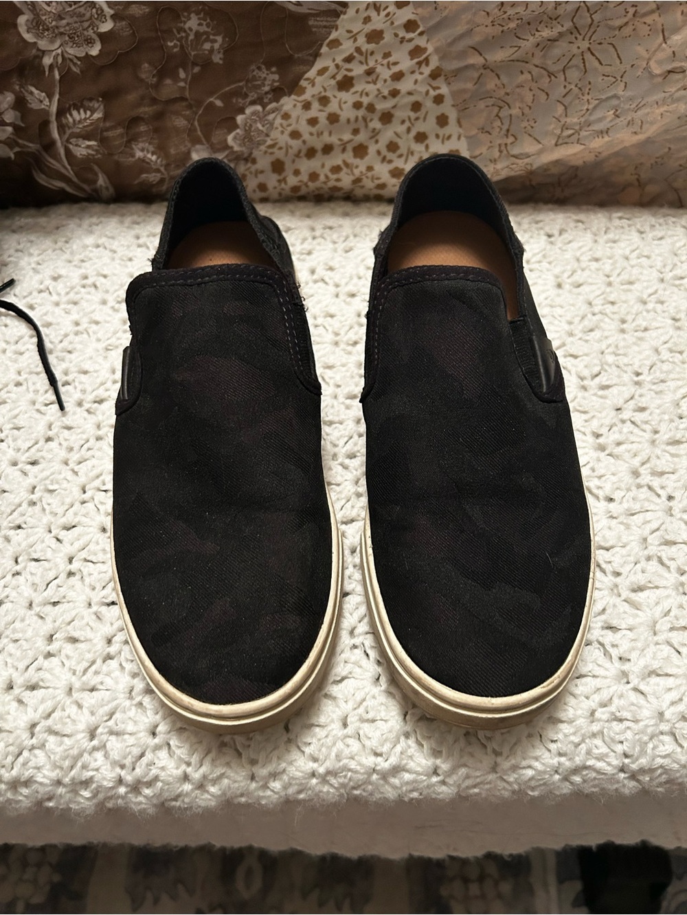 OluKai Black Slip-On Women's Flats with White Sole